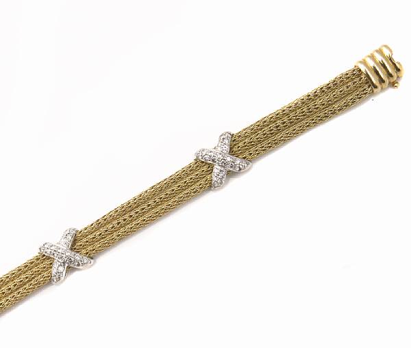 Appraisal: A diamond and two-tone K gold X bracelet estimated total