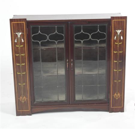 Appraisal: An Art Nouveau inlaid mahogany display cabinet circa with single