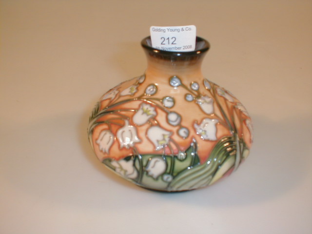 Appraisal: A modern Moorcroft small squat globular vase with lily-of-the-valley decoration