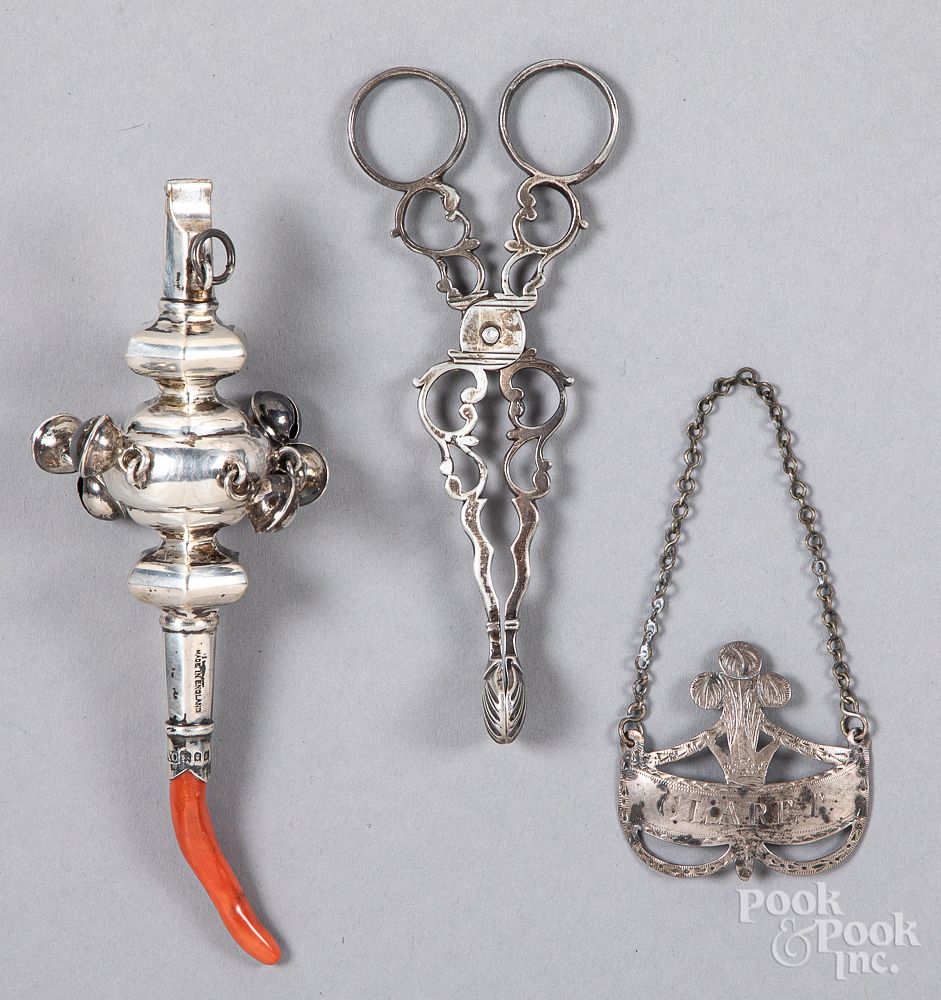 Appraisal: English silver rattle whistle sugar tongs etc English silver rattle