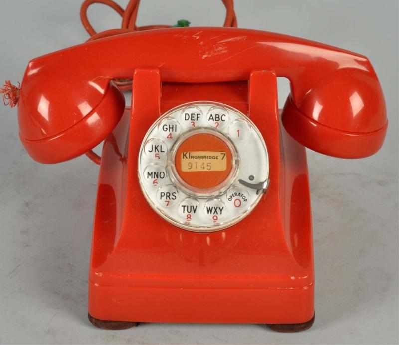 Appraisal: Western Electric Red Cradle Telephone Plastic base dated shell dated