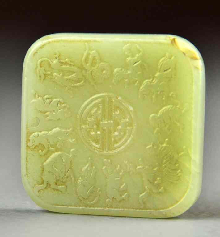 Appraisal: A Fine Chinese Qing Carved White Jade PlaqueCarved on one