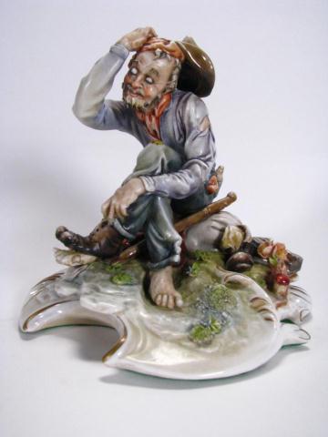 Appraisal: Antonio Borsato ''Seated Tramp'' Sculpture depicting hobo '' x ''