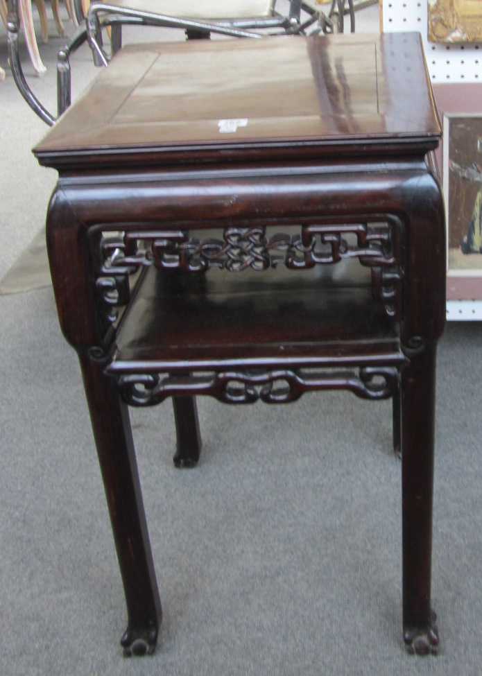 Appraisal: An early th century Chinese hongmu square urn stand with