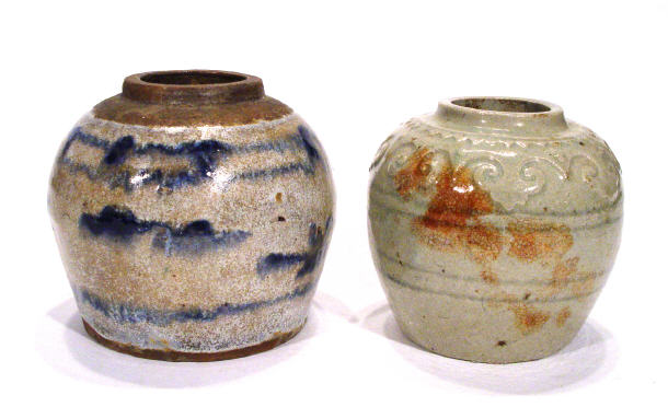 Appraisal: Two oriental stoneware vases one with incised and relief moulded