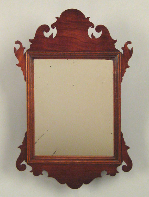 Appraisal: Chippendale mahogany looking glass ca with a scrolled crest and