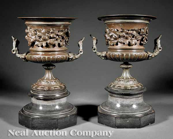 Appraisal: A Pair of French Bronze and Marble Urns th c