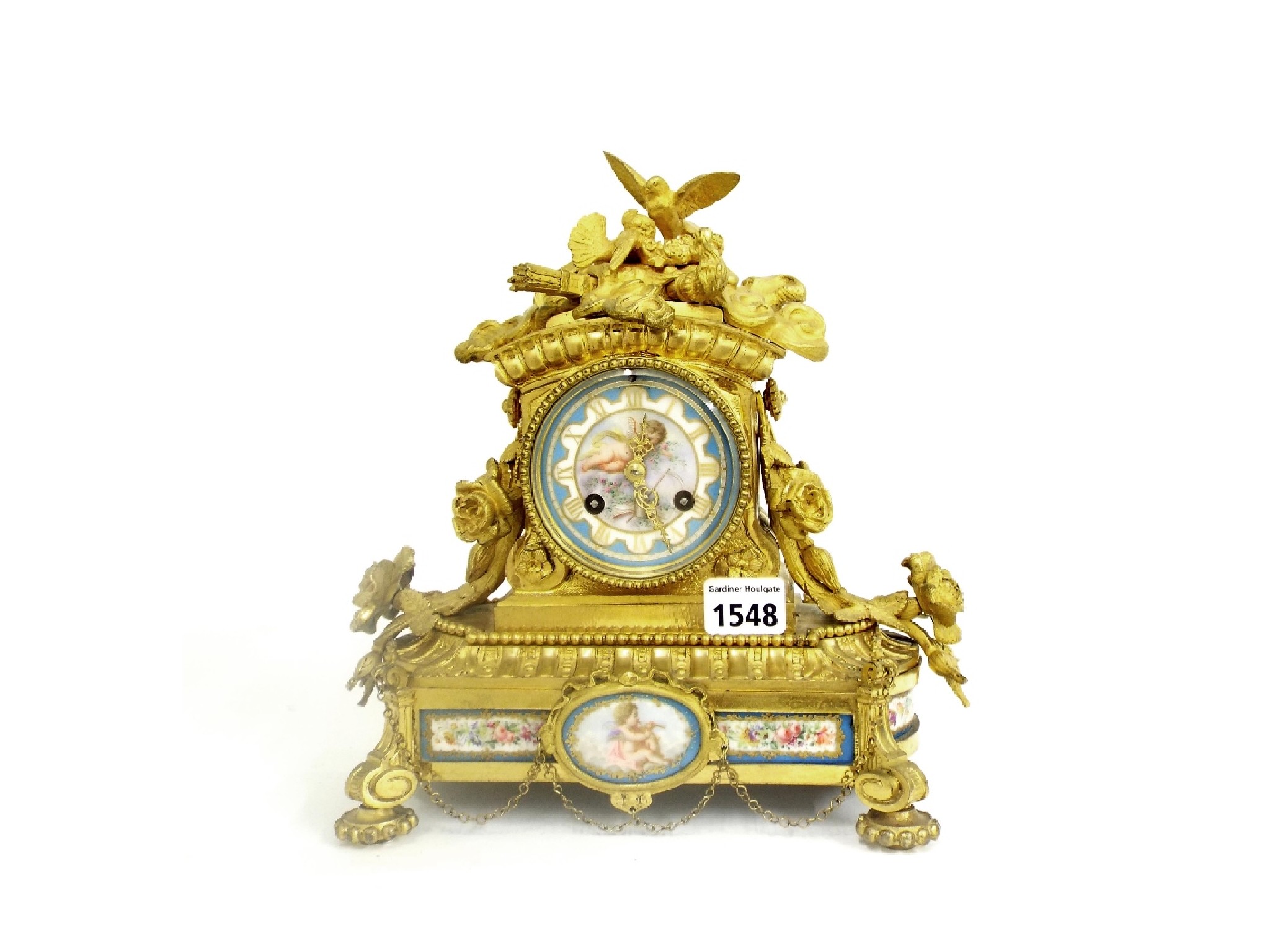 Appraisal: French ormolu and porcelain panelled small two train mantel clock