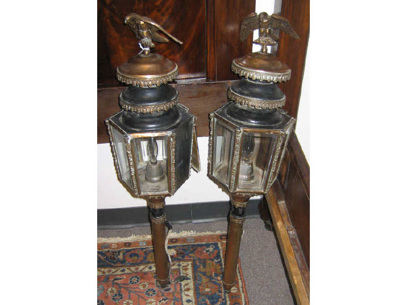 Appraisal: PAIR OF ENGLISH TH CENTURY COACHING LANTERNS Showing eagle finials