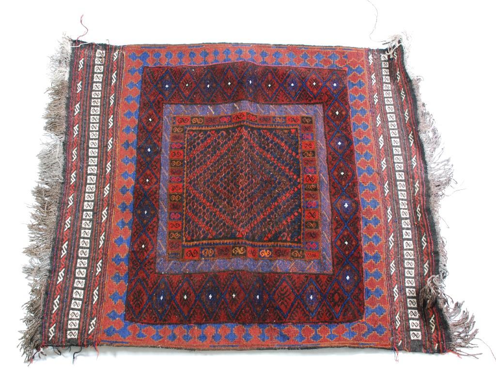 Appraisal: SHIRAZ RUG dark red brown orange and black with small