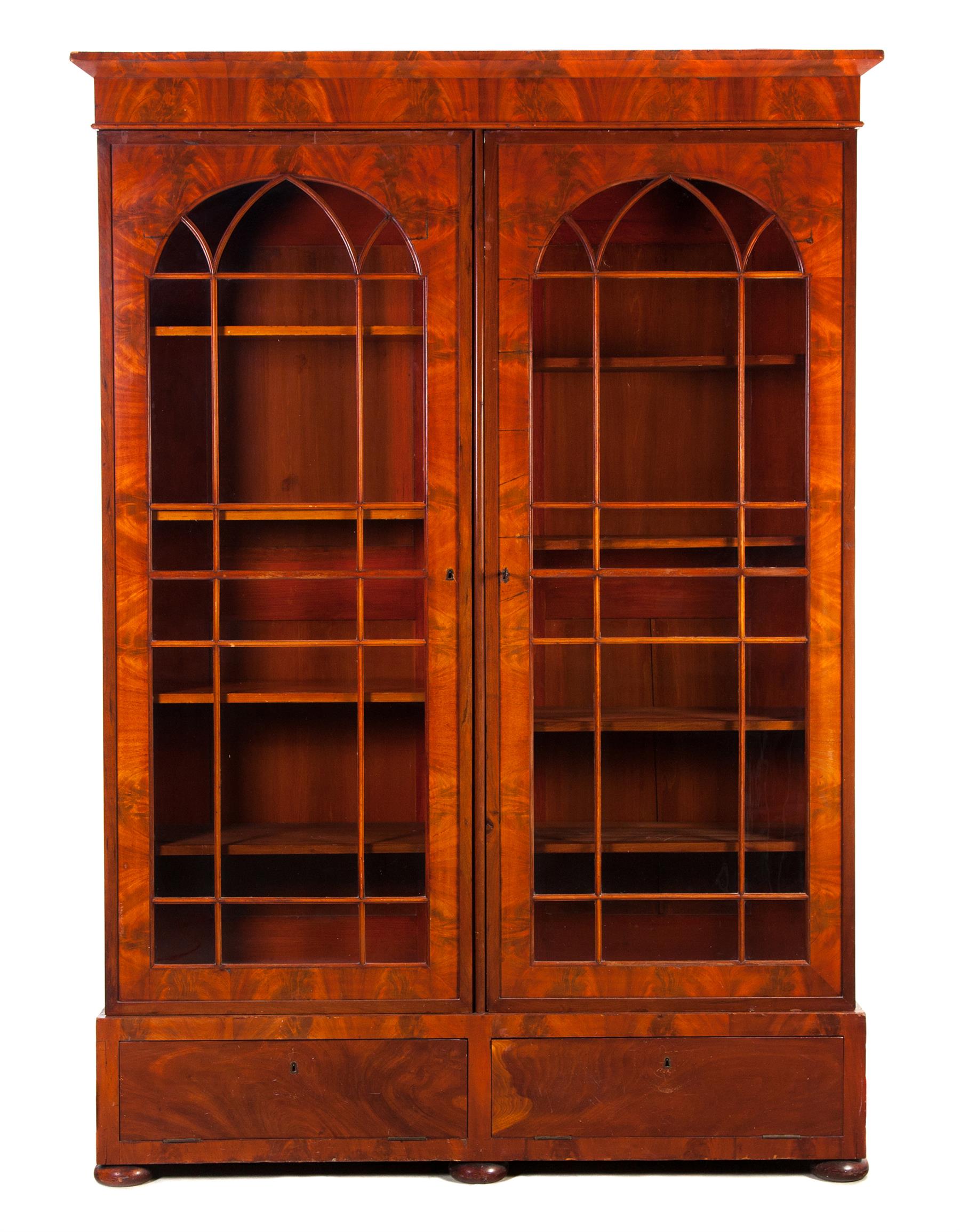 Appraisal: EMPIRE GOTHIC REVIVAL BREAKDOWN BOOKCASE American mid th century mahogany