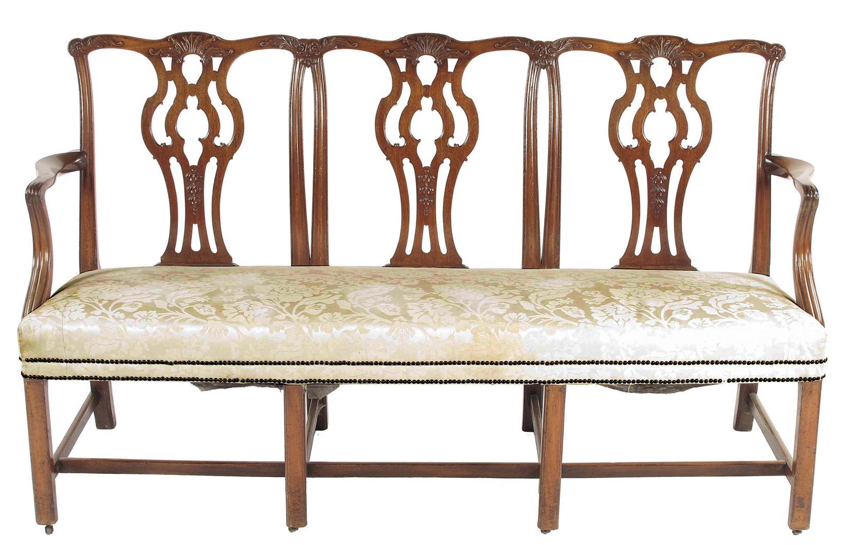 Appraisal: A George III mahogany triple chair back settee