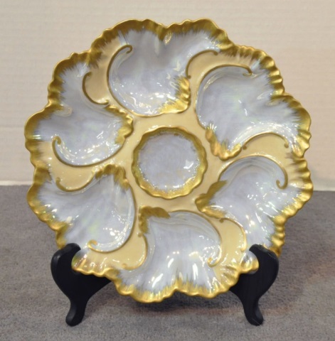 Appraisal: Limoges Oyster PlateHaving gilt rim with blue-white luster glaze Dia