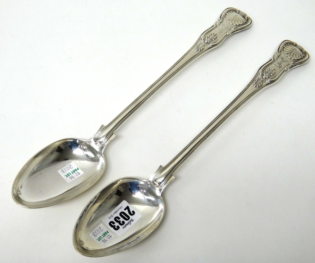 Appraisal: A pair of William IV silver King's pattern basting spoons