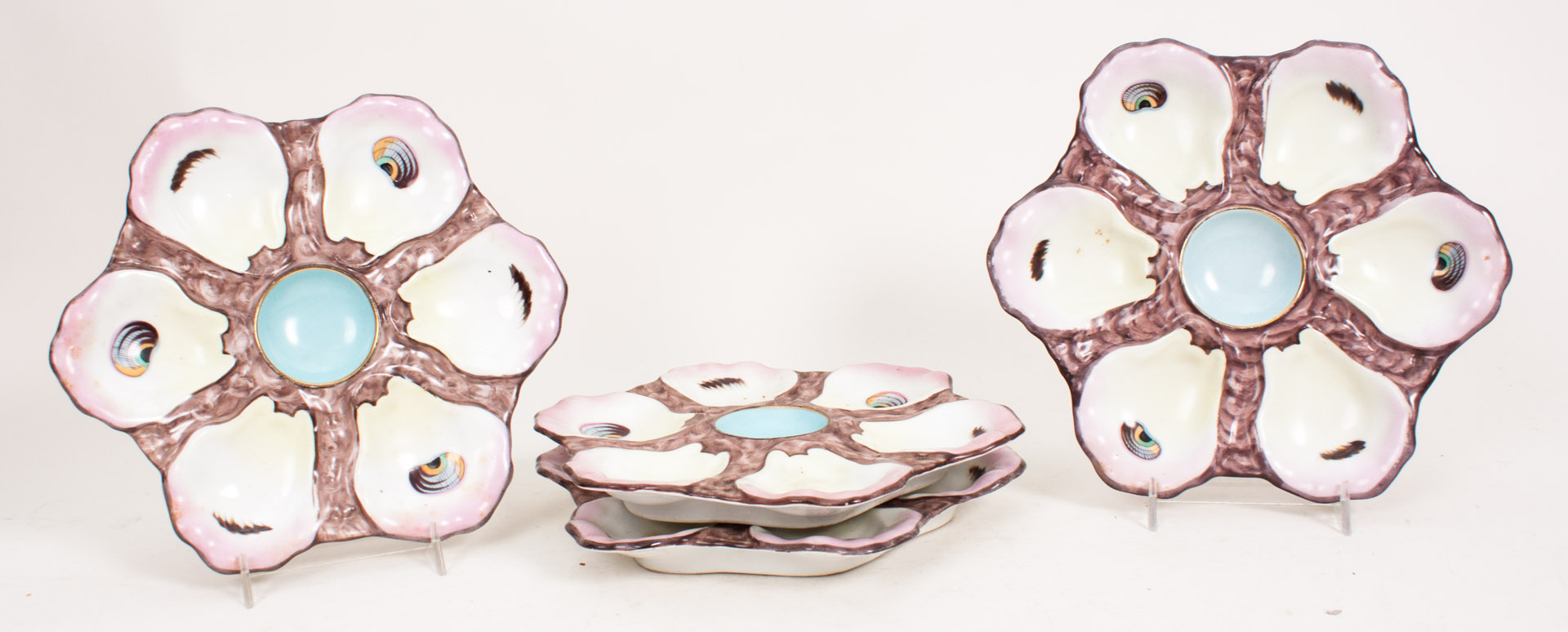 Appraisal: Set of four German porcelain oyster plates late th century