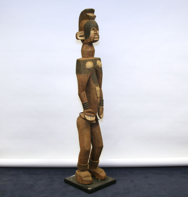 Appraisal: African Igbo carved female figure Nigeria details such as the