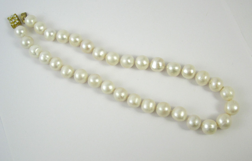 Appraisal: PRINCESS LENGTH WHITE PEARL NECKLACE measuring approximately inches in length