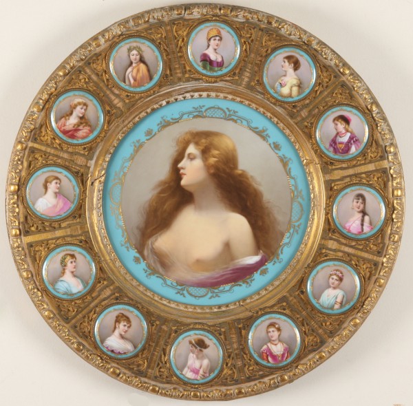 Appraisal: Plaque features portrait of woman at center with long flowing