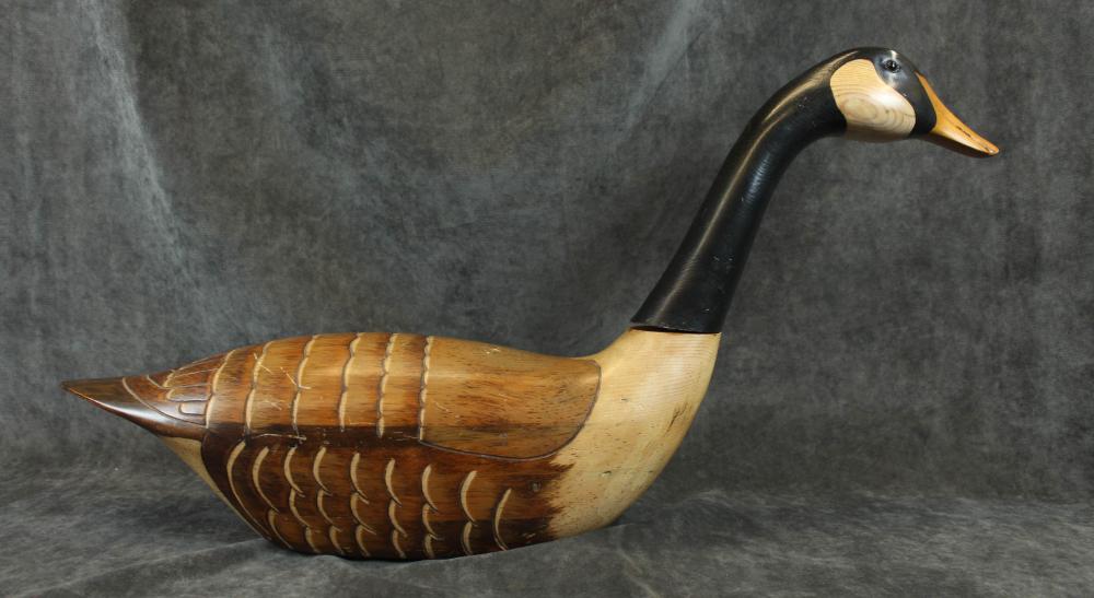 Appraisal: DECORATIVE CANADIAN GOOSE DECOY hand carved laminated wood body painted