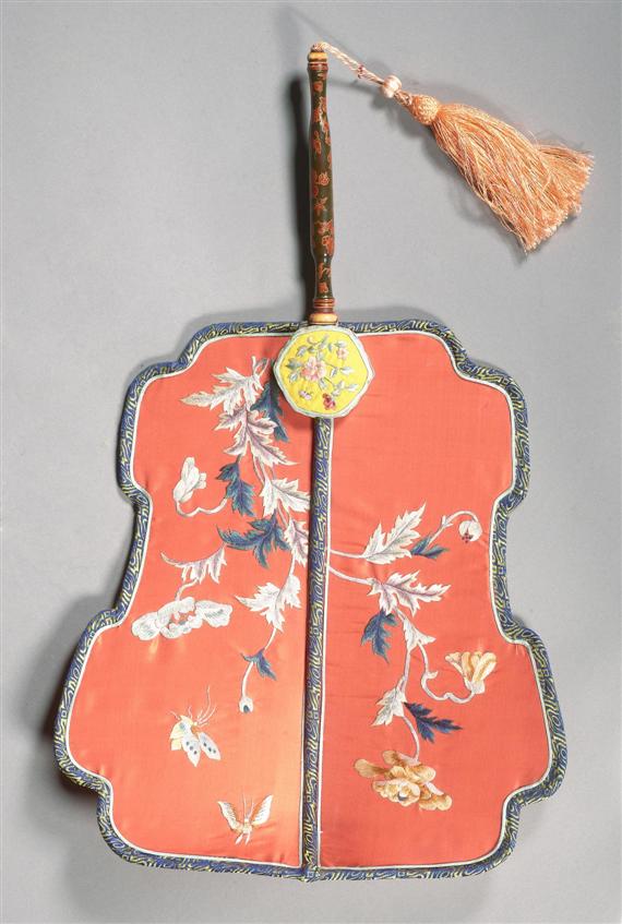 Appraisal: AN EMBROIDERED RED SILK FAN WITH LACQUERED HANDLE China th