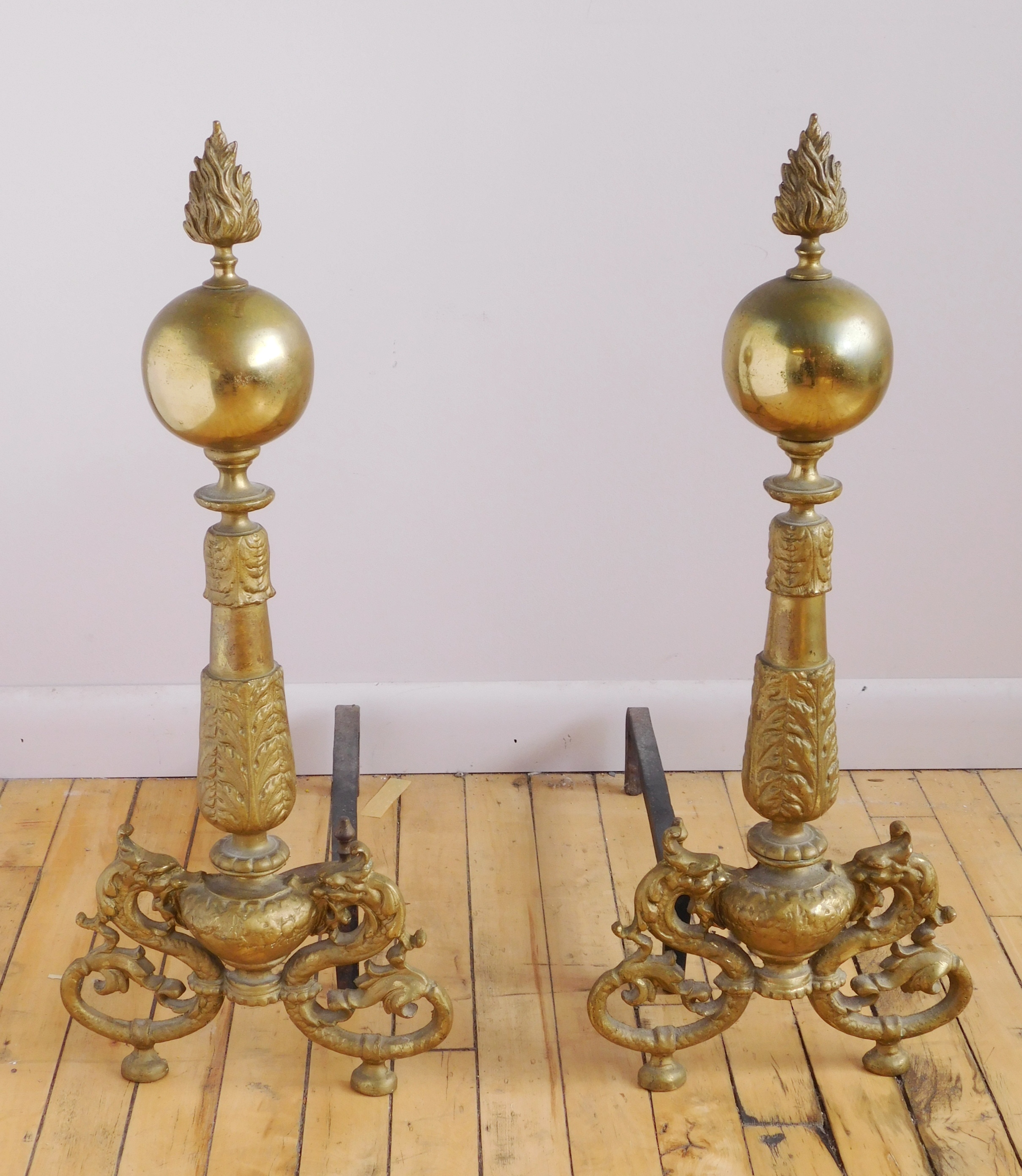 Appraisal: Pair of Chippendale style brass andirons with flame finials ''