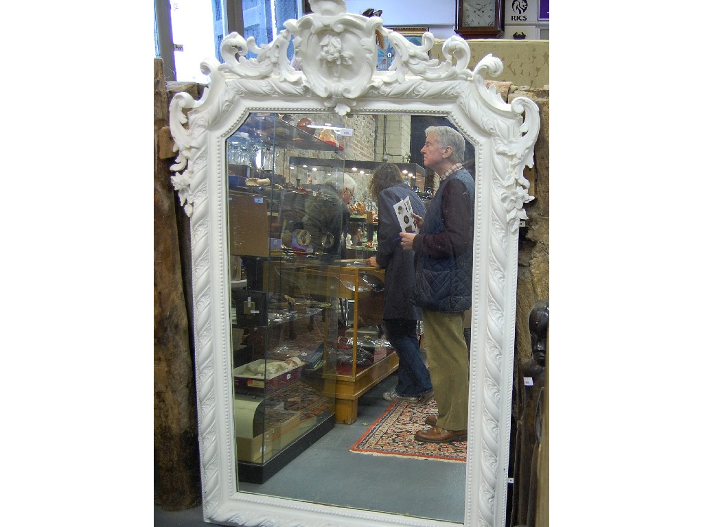 Appraisal: A large th century carved giltwood framed mirror later overpainted