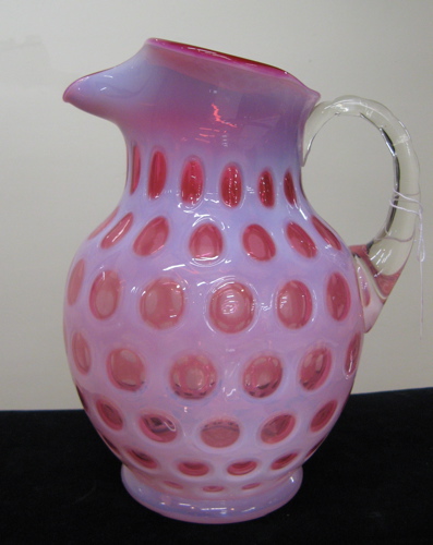 Appraisal: AMERICAN VICTORIAN CRANBERRY OPALESCENT PITCHER in the coin spot pattern