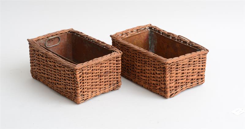 Appraisal: PAIR OF WOVEN WICKER BASKETS Fitted with copper liners x