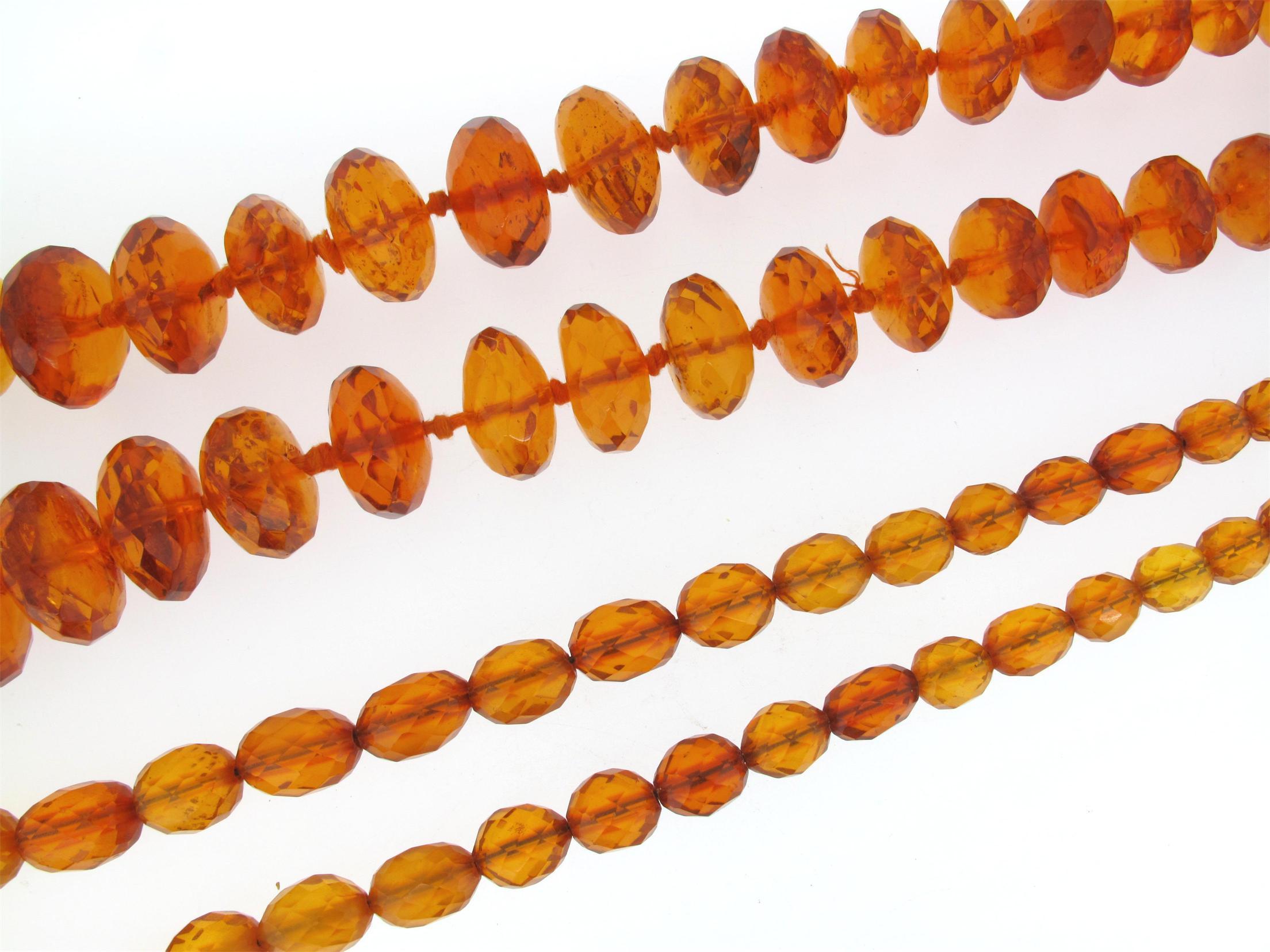 Appraisal: A faceted amber bead necklace