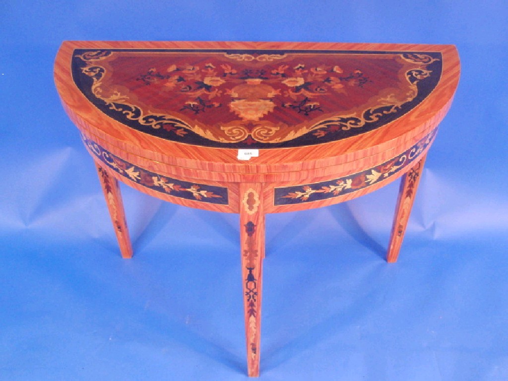 Appraisal: A modern marquetry demi-lune folding tea table cm