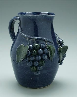 Appraisal: Edwin Meaders pitcher with grapes applied grapes and green leaves