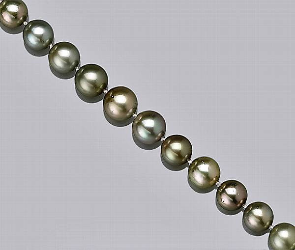 Appraisal: A pistachio South Sea cultured pearl and diamond graduated necklace