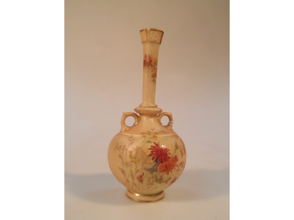 Appraisal: A Royal Worcester bottle vase with small loop handles to