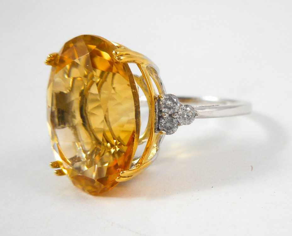 Appraisal: CITRINE DIAMOND AND FOURTEEN KARAT GOLD RING The white and