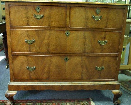 Appraisal: A walnut chest of drawers of th Century design the