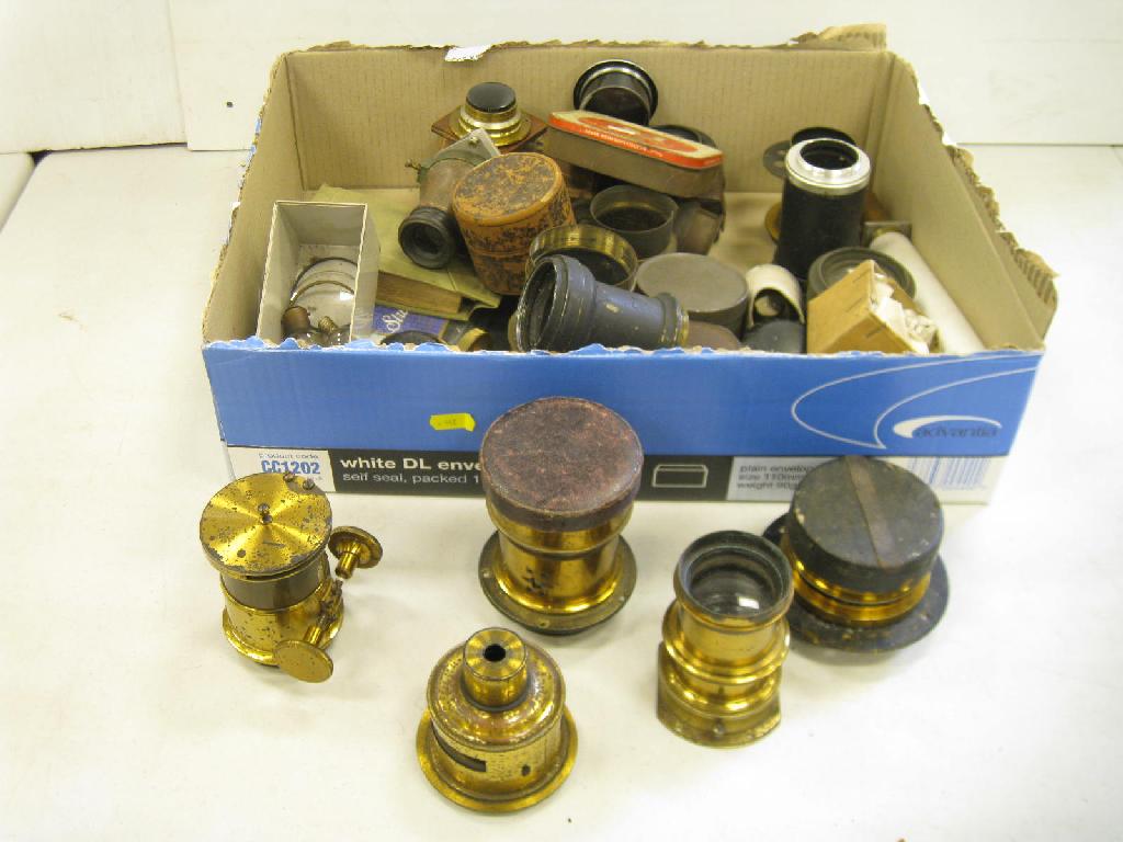 Appraisal: A box of brass Magic Lantern Lenses etc