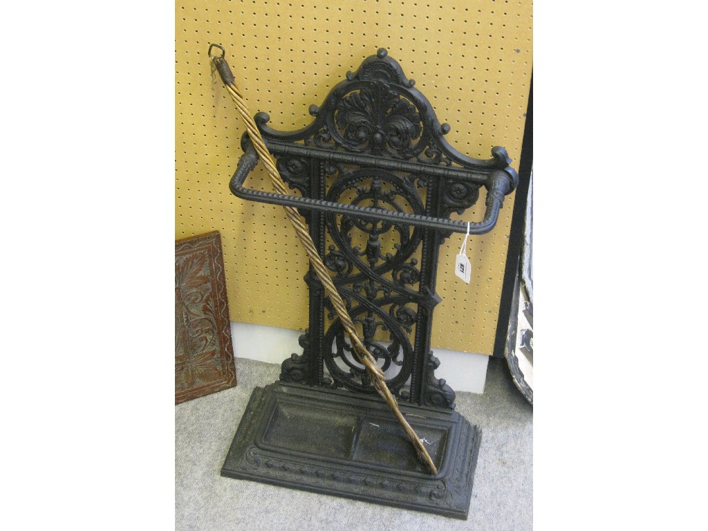 Appraisal: Lot comprising Victorian cast iron stickstand and a carpet beater