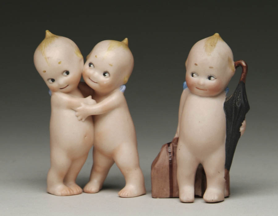 Appraisal: BISQUE ACTION KEWPIES Includes Huggers signed on foot and Traveler