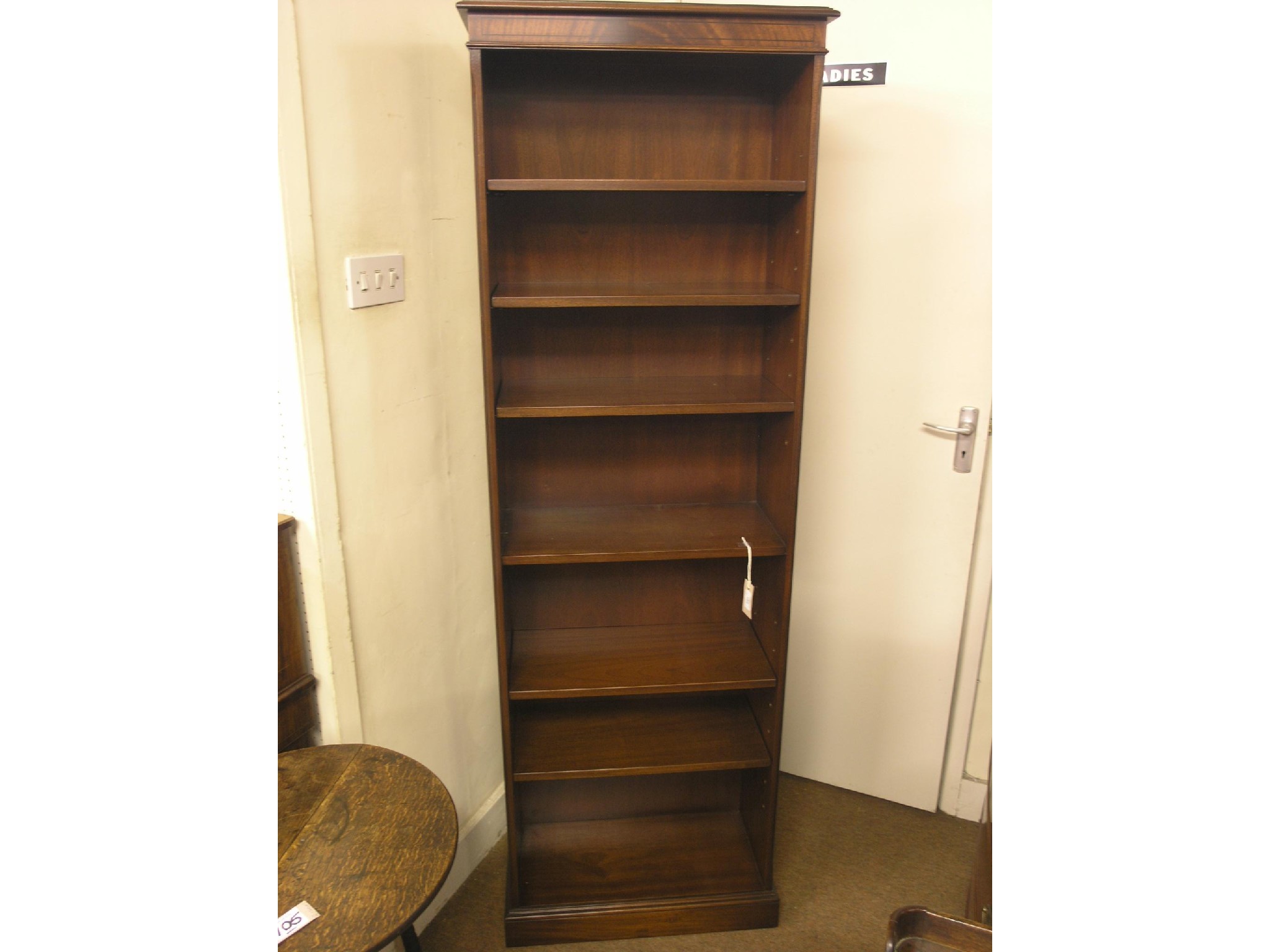 Appraisal: A Bevan Funnell Reprodux bookcase narrow form with five adjustable