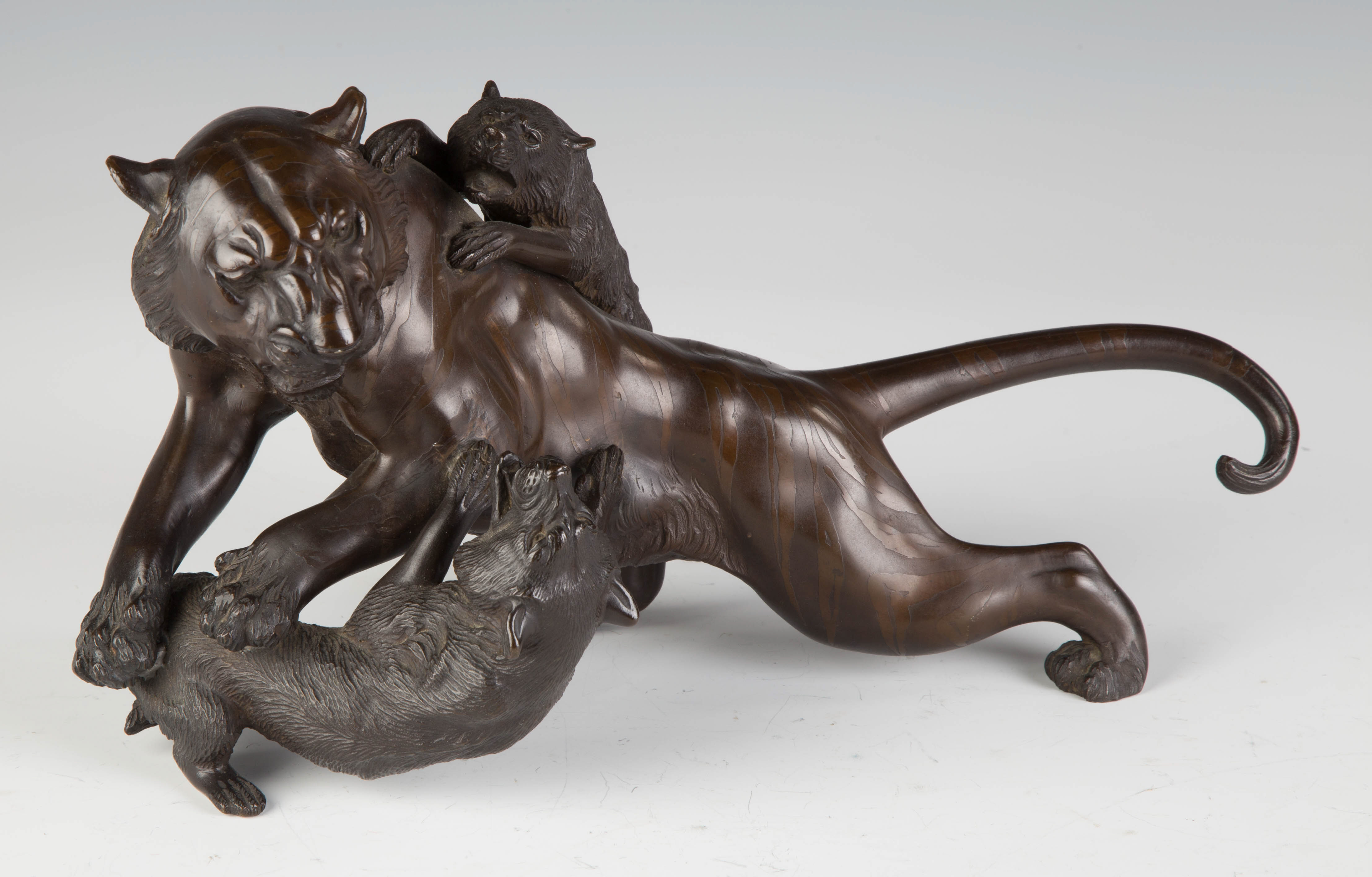 Appraisal: Japanese Bronze Lion and Wolves Signed