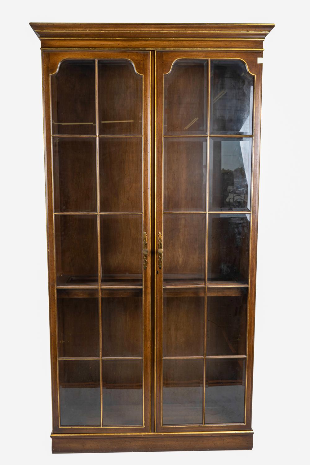 Appraisal: PAIR OF PARCEL GILT WALNUT VITRINESeach with beveled glass panes