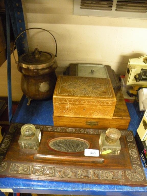 Appraisal: A carved mahogany ink stand a turned oak biscuit barrel