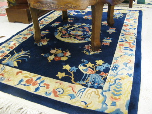 Appraisal: FOUR CHINESE HAND KNOTTED AREA RUGS ' X ' Peking