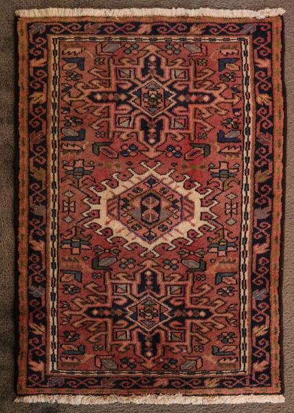 Appraisal: A PERSIAN KARAJA HAND MADE WOOL ON COTTON RUGThe traditional