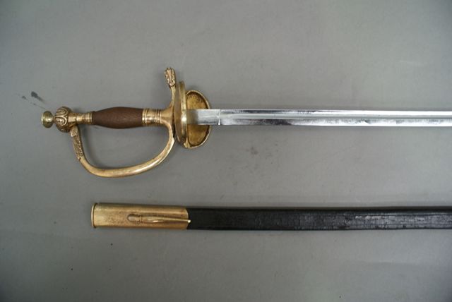 Appraisal: An Austrian Court sword with double edged shell guard inch