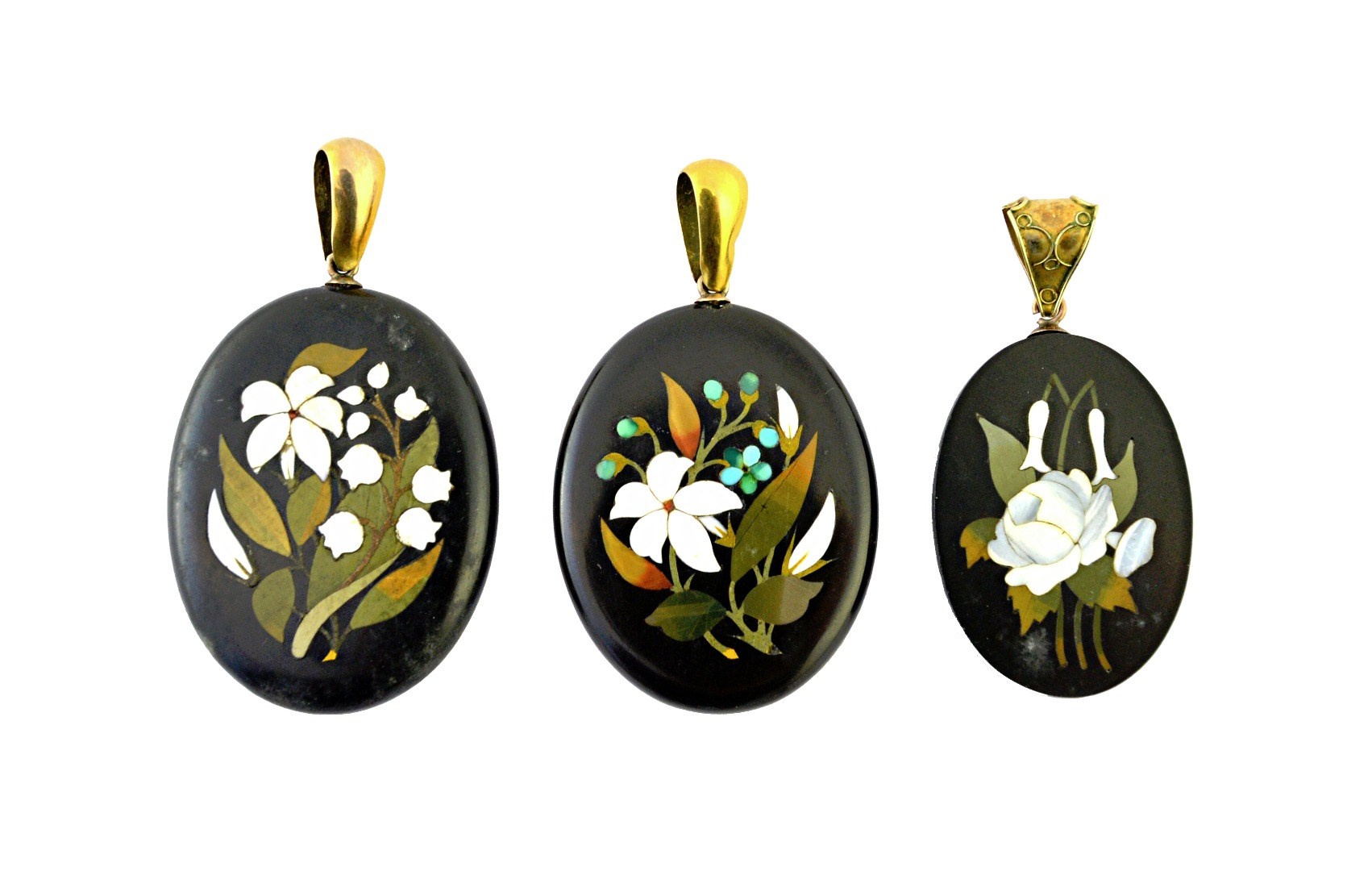 Appraisal: An oval pietra dura pendant with floral decoration and two