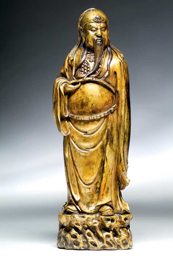 Appraisal: GILT BRONZE IMMORTAL FIGURE Chinese Ming-style gilt bronze figure of