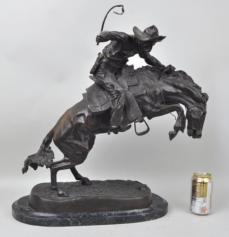 Appraisal: Western Bronze After Remington reproduction patinated bronze sculpture of Bronco