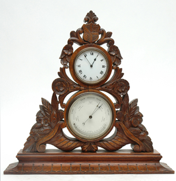 Appraisal: A TH CENTURY OAK FRAMED COMBINATION CLOCK AND BAROMETER The