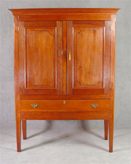 Appraisal: Cherry Two Door Cupboard Circa On high tapered legs Carved